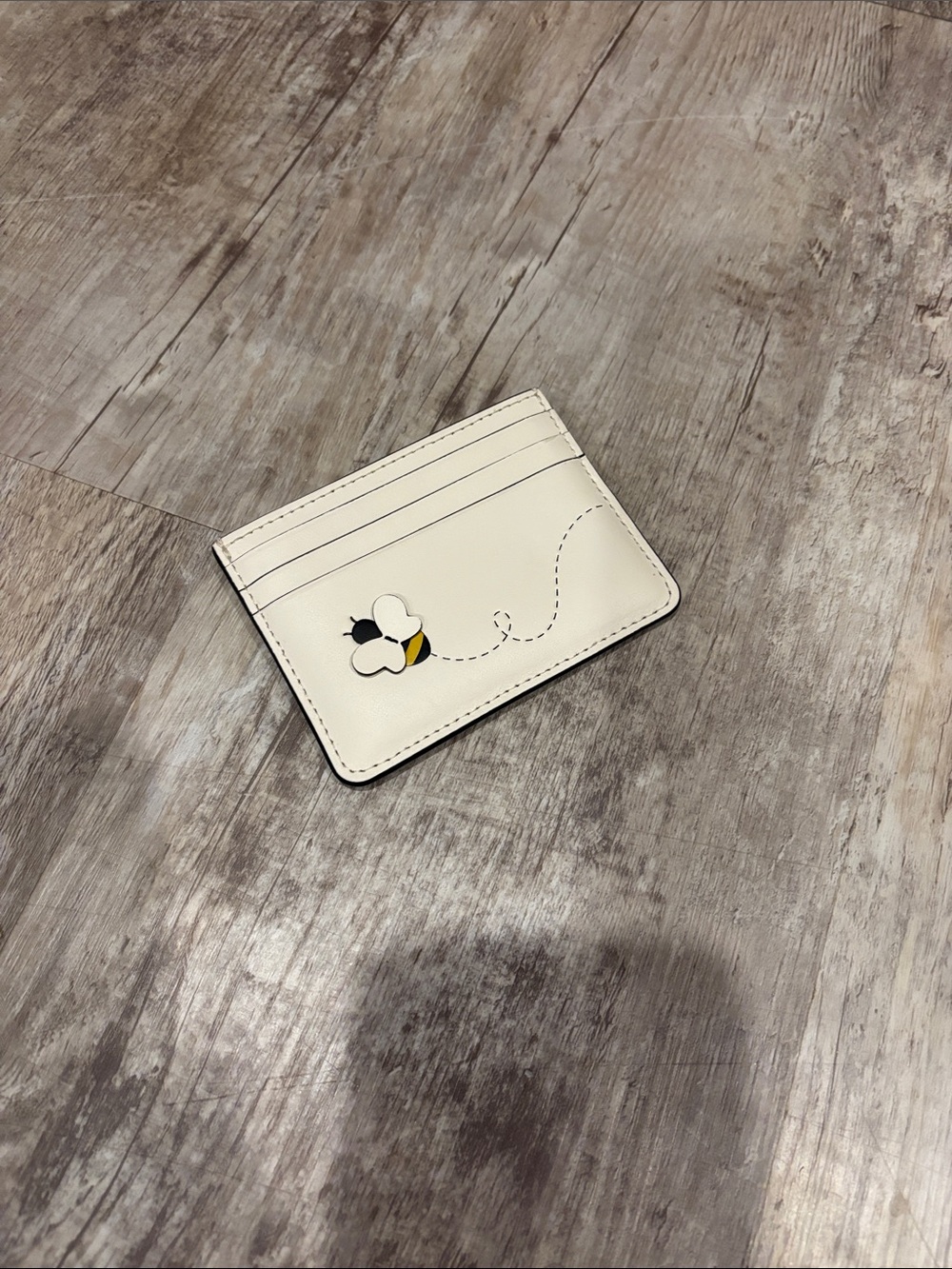 kate spade Cream Card Holder with Bee Motif